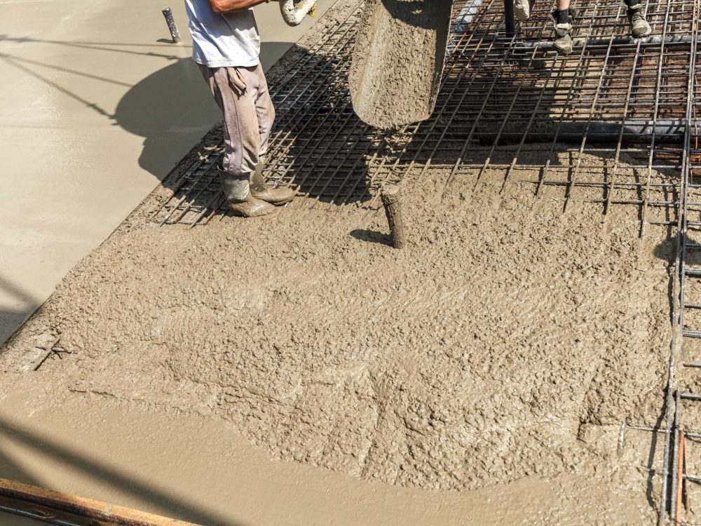 pouring-concrete-into-the-construction-of-the-house-builders-are-pouring-ready-mixed-concrete pouring-concrete-into-the-construction-of-the-house-builders-are-pouring-ready-mixed-concrete